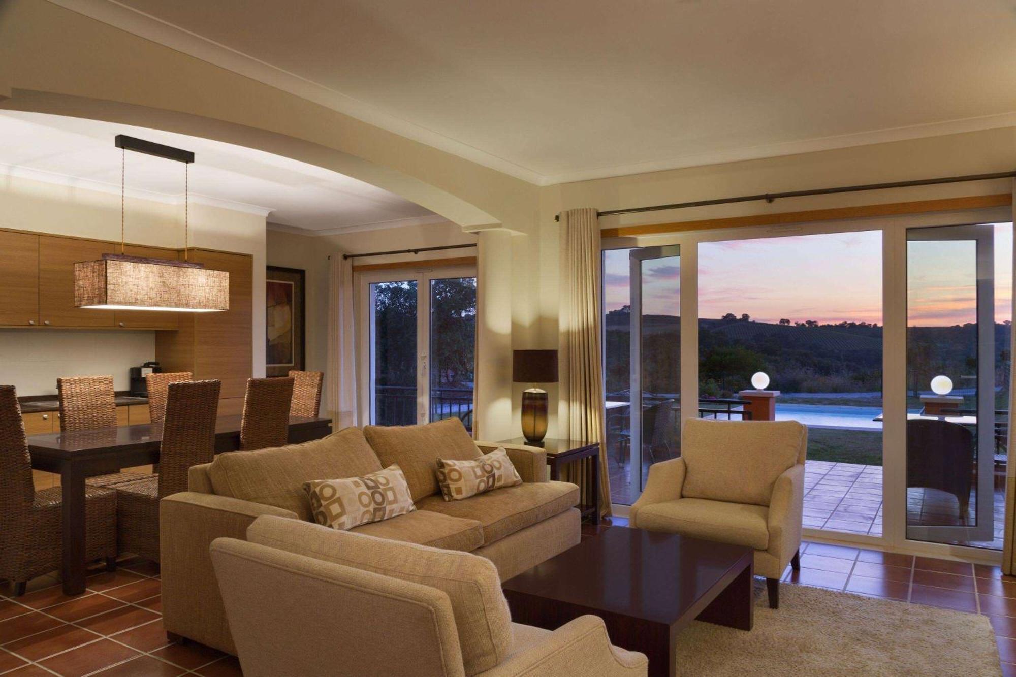 Dolce Camporeal Lisboa Turcifal Exterior photo A living room in a typical condominium